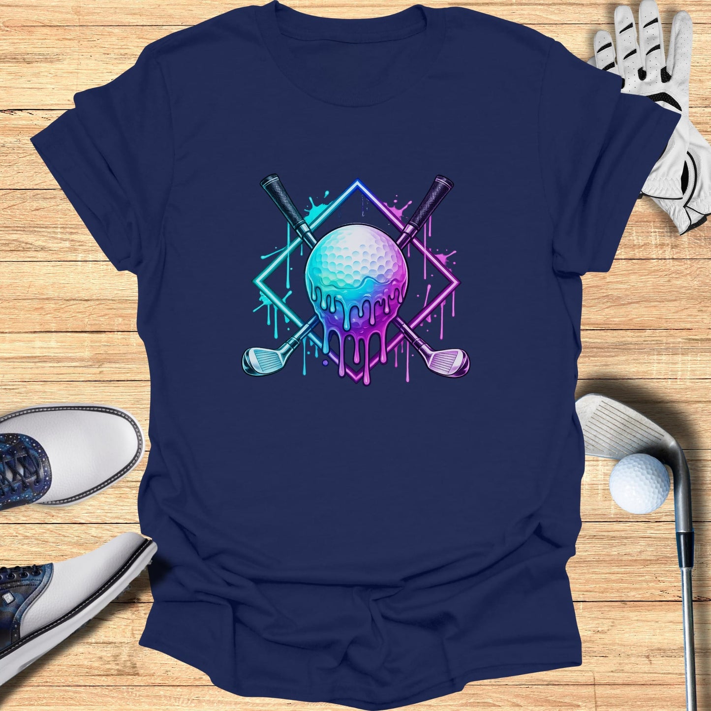 Golf balls and clubs design with neon drips on navy blue t-shirt.