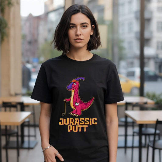 Black t-shirt with purple dinosaur holding golf club, text "JURASSIC PUTT".