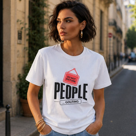 Woman wearing white t-shirt with "PEOPLE ... GOLFING" and "DO NOT DISTURB" text.