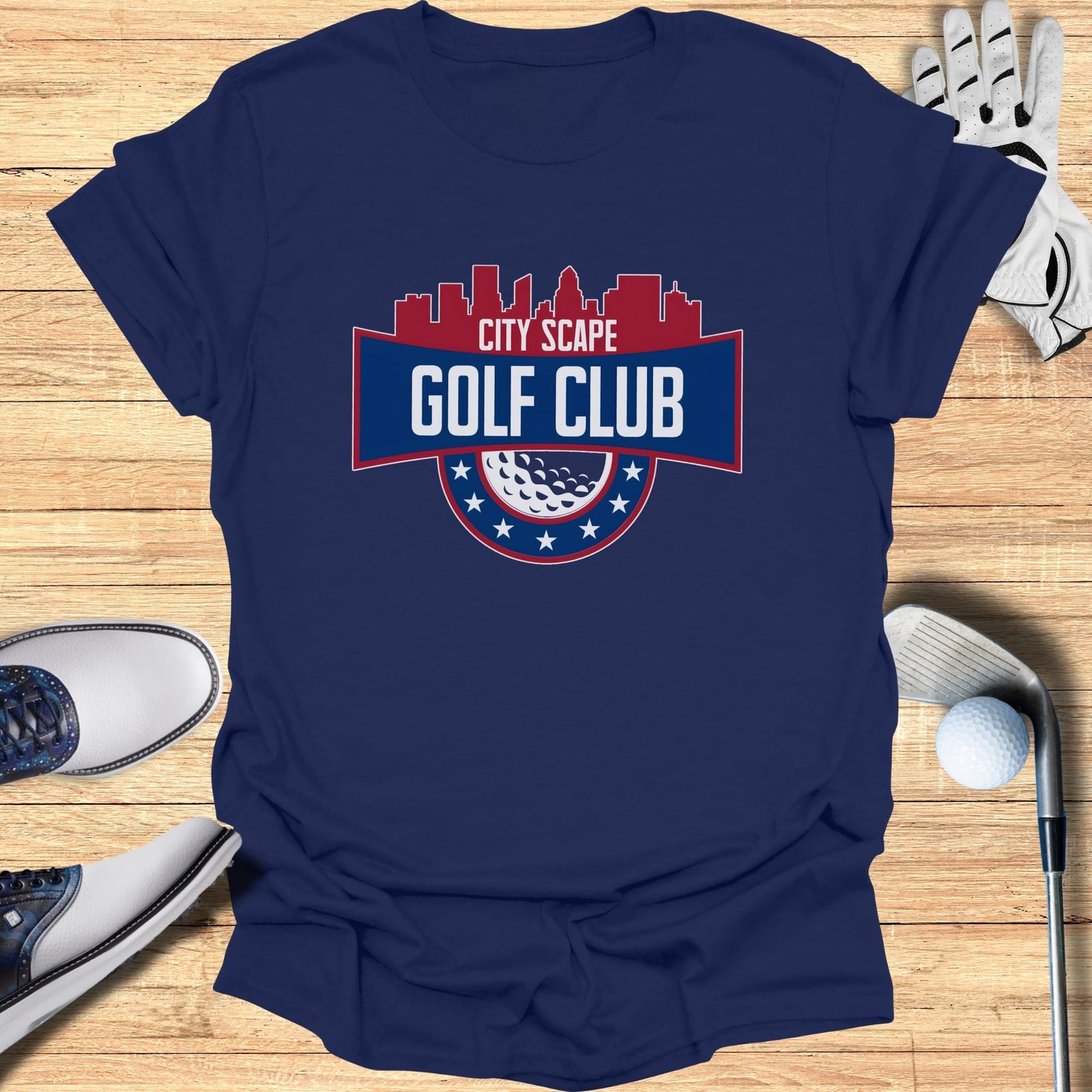Navy t-shirt with "City Scape Golf Club" logo featuring a golf ball and US flag accents.