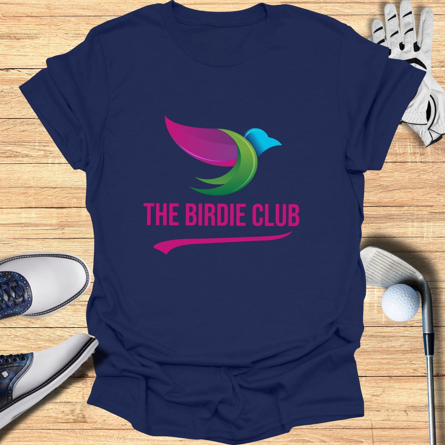 Navy t-shirt with colorful bird logo and text "THE BIRDIE CLUB".