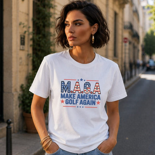 White t-shirt with "M.A.G.A. Make America Golf Again" text and flag design.