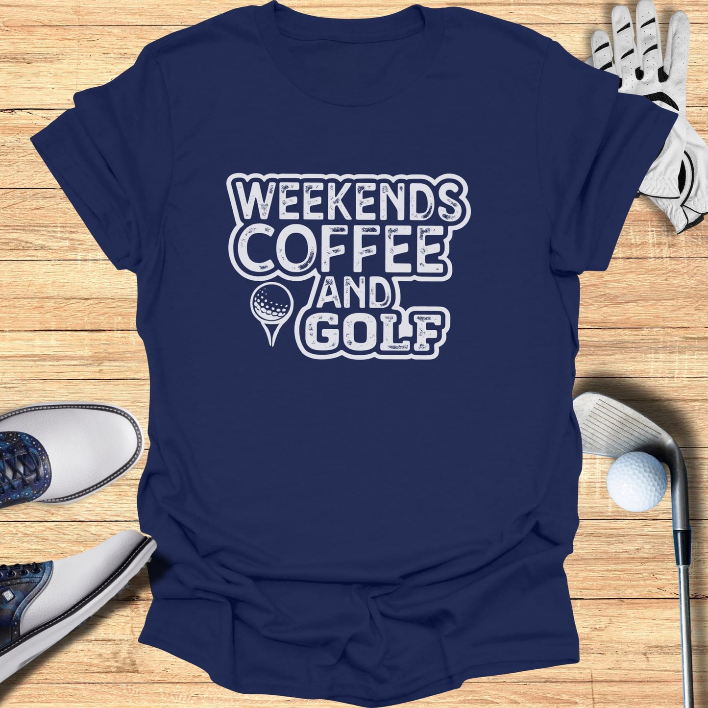 Navy t-shirt with "Weekends Coffee And Golf" text and golf ball graphic.