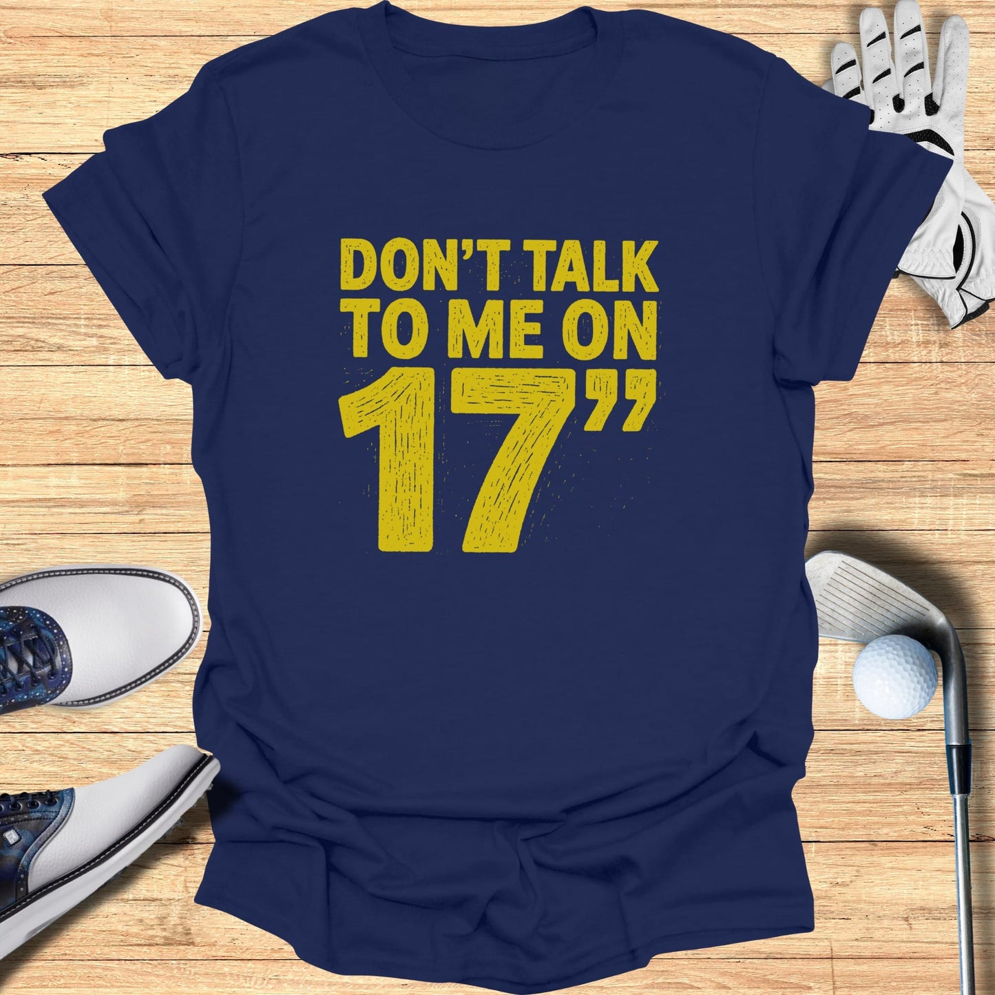 Navy t-shirt with "DON'T TALK TO ME ON 17" in yellow distressed font.