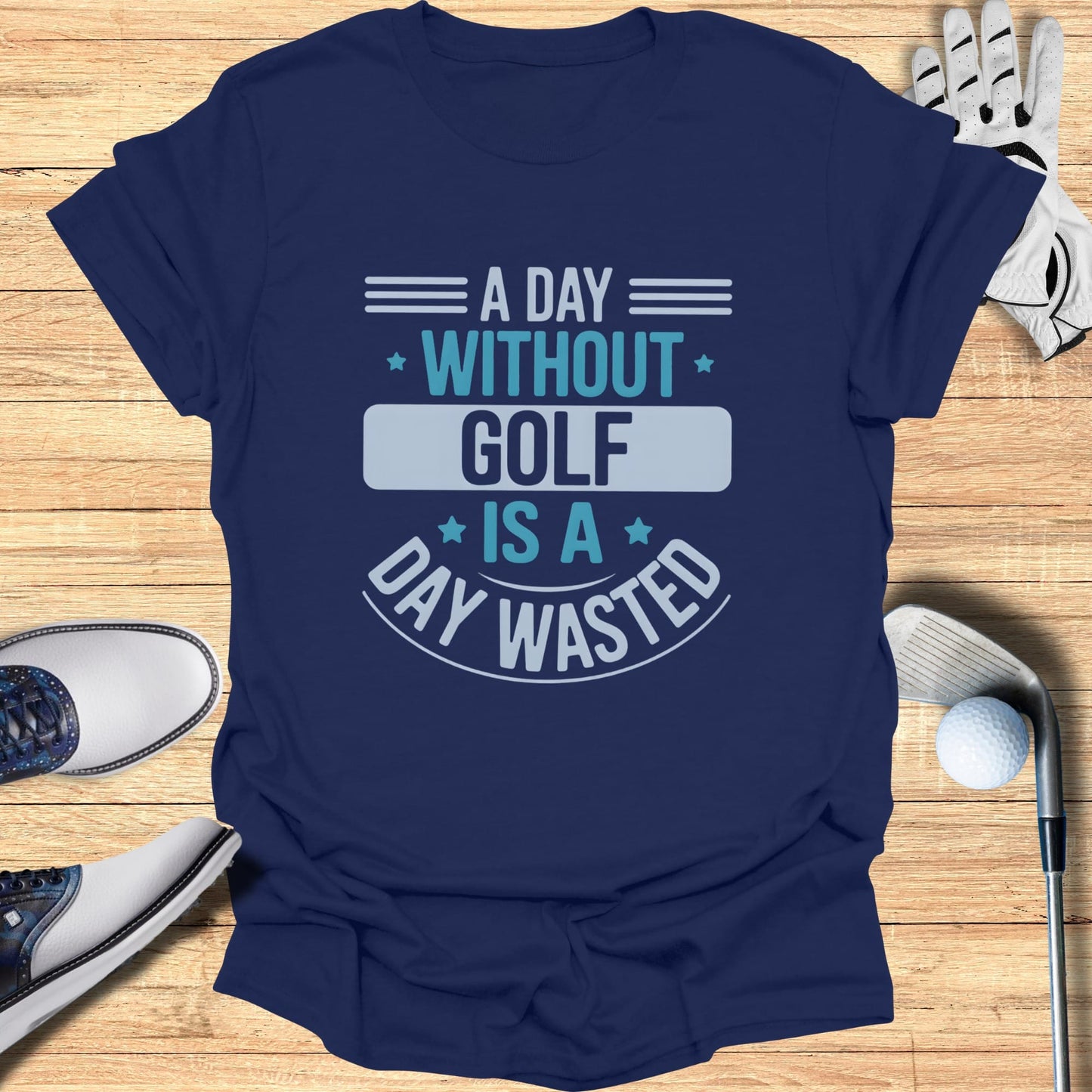 Navy t-shirt with "A day without golf is a day wasted" text.