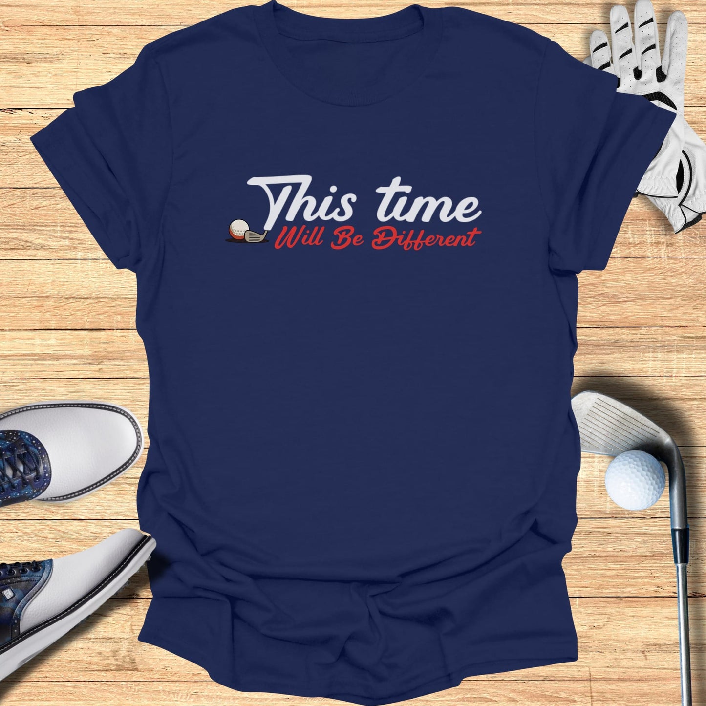 Navy t-shirt with "This time Will Be Different" and golf imagery.