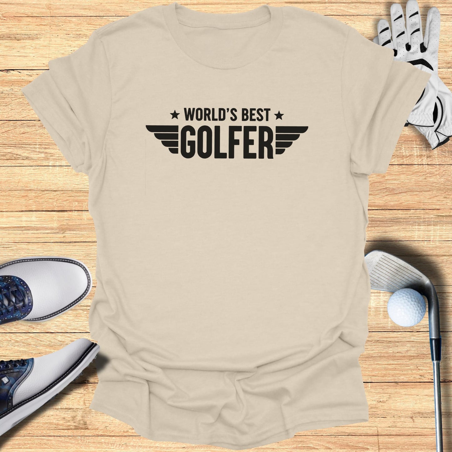 Light tan t-shirt with "WORLD'S BEST GOLFER" in black text.