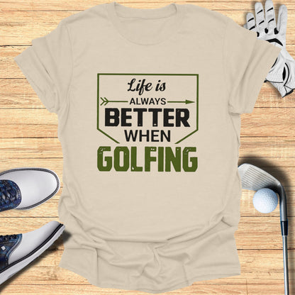 T-shirt with "Life is ALWAYS Better When GOLFING" text, golf clubs, ball, and shoes.