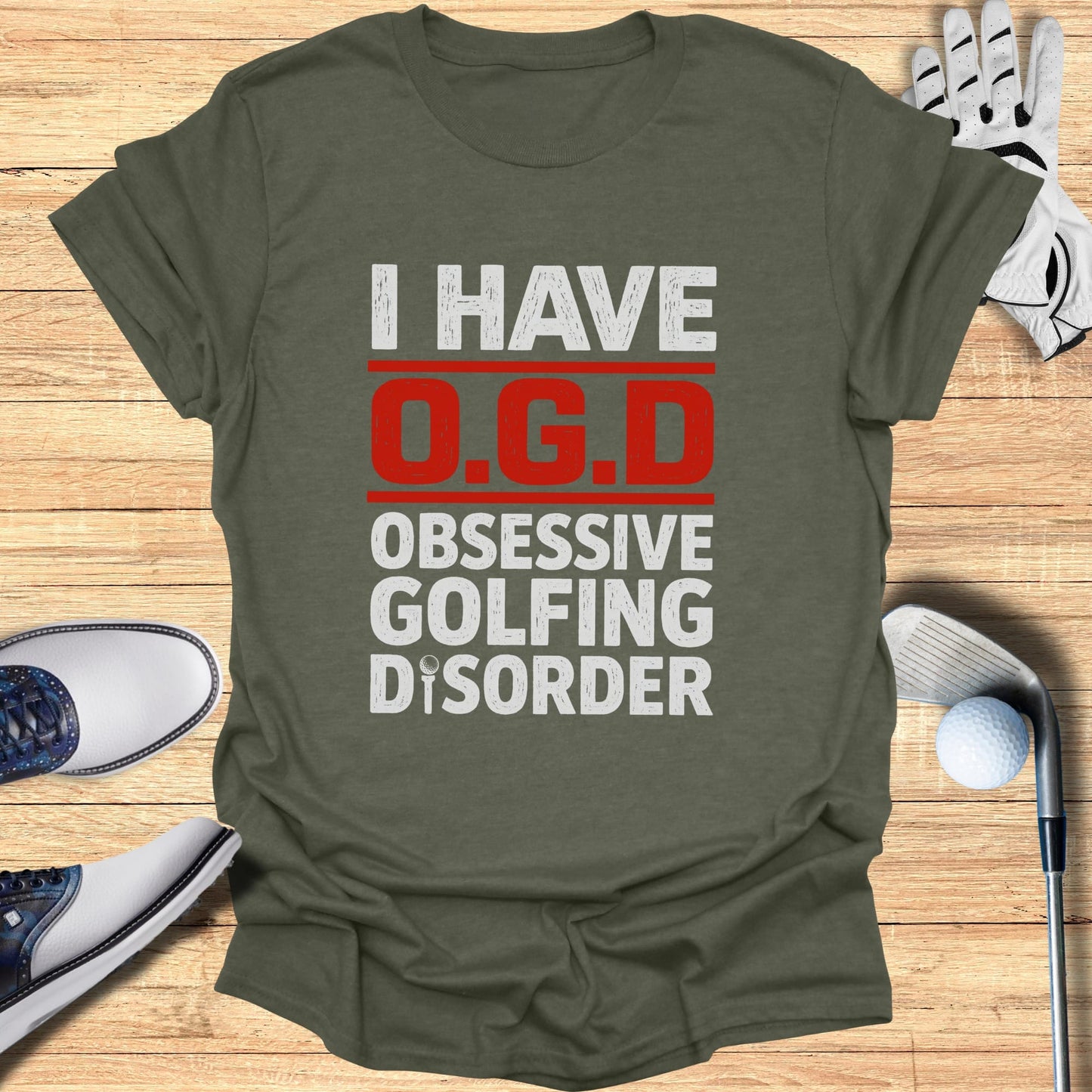Olive green t-shirt with "I Have O.G.D. Obsessive Golfing Disorder" text.