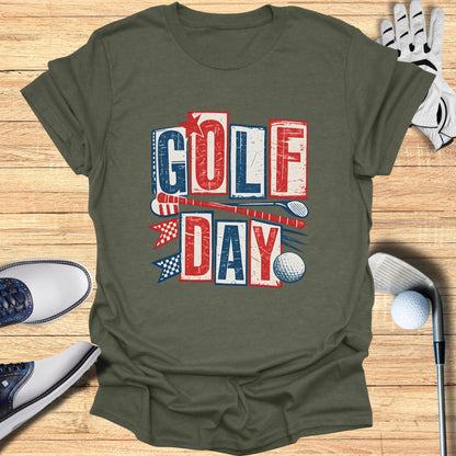 Olive green t-shirt with "GOLF DAY" in red, white, and blue distressed lettering.
