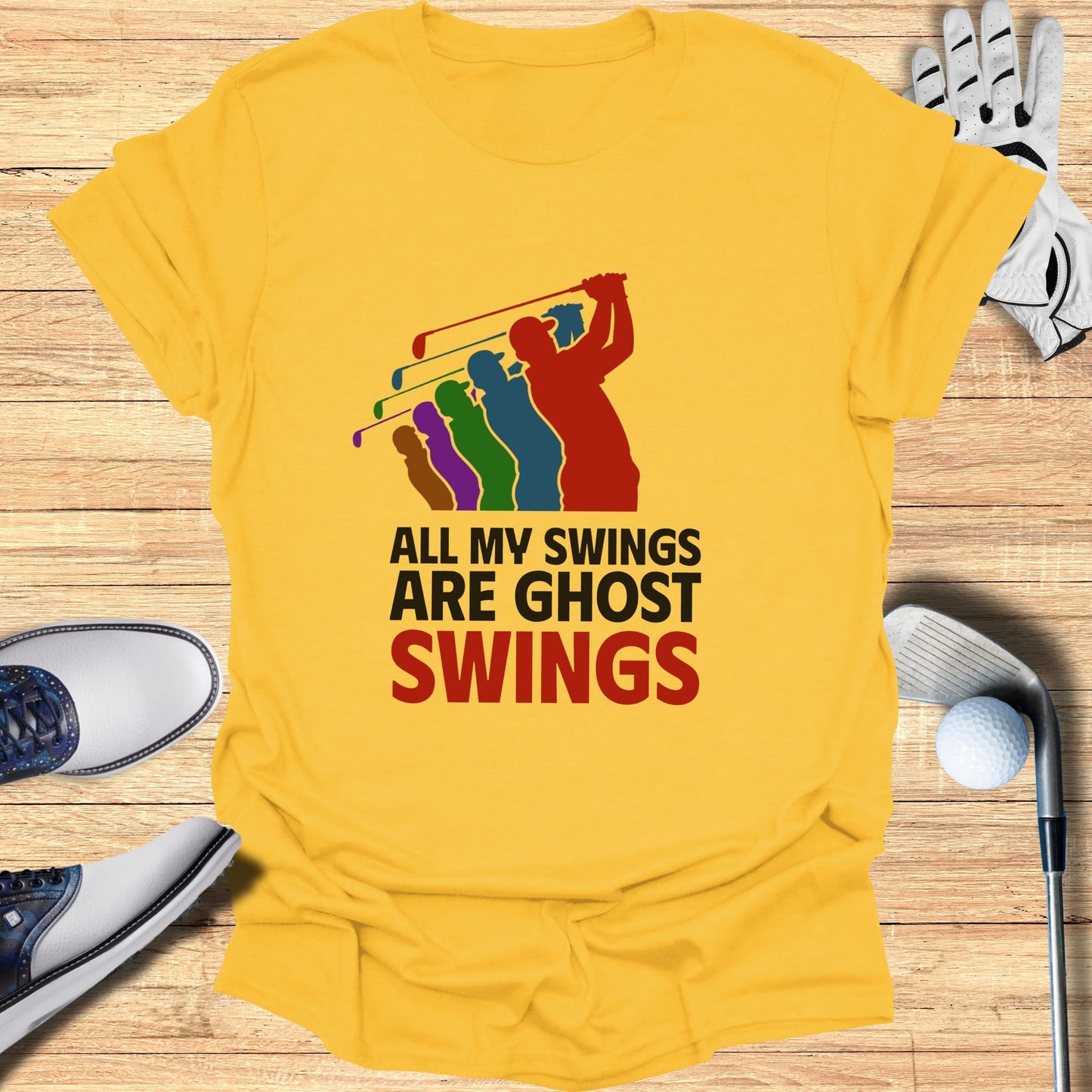 Yellow t-shirt with "ALL MY SWINGS ARE GHOST SWINGS" and golfer silhouette design.