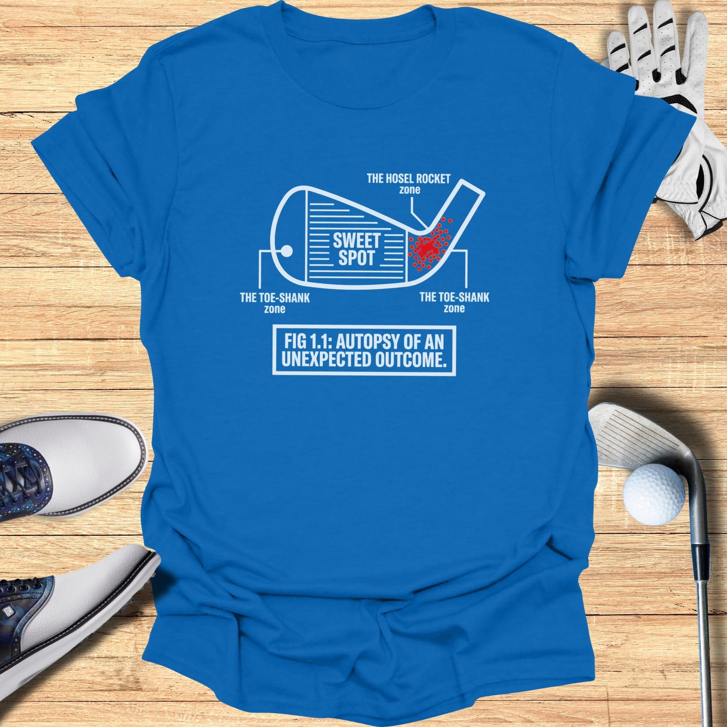 Blue t-shirt with diagram of golf club impact zones: Sweet Spot, Hosel Rocket, Toe-shank.