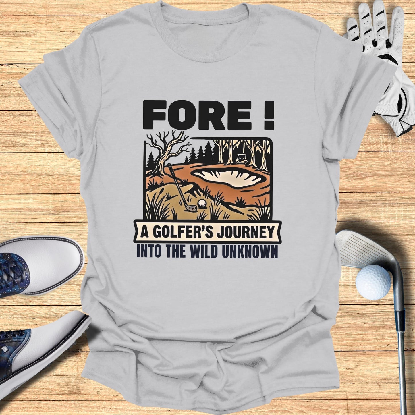 Golf shirt with "Fore! A Golfer's Journey Into The Wild Unknown" text and golf course graphic.