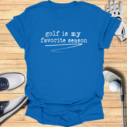 Blue t-shirt with "golf is my favorite season" printed in white text.