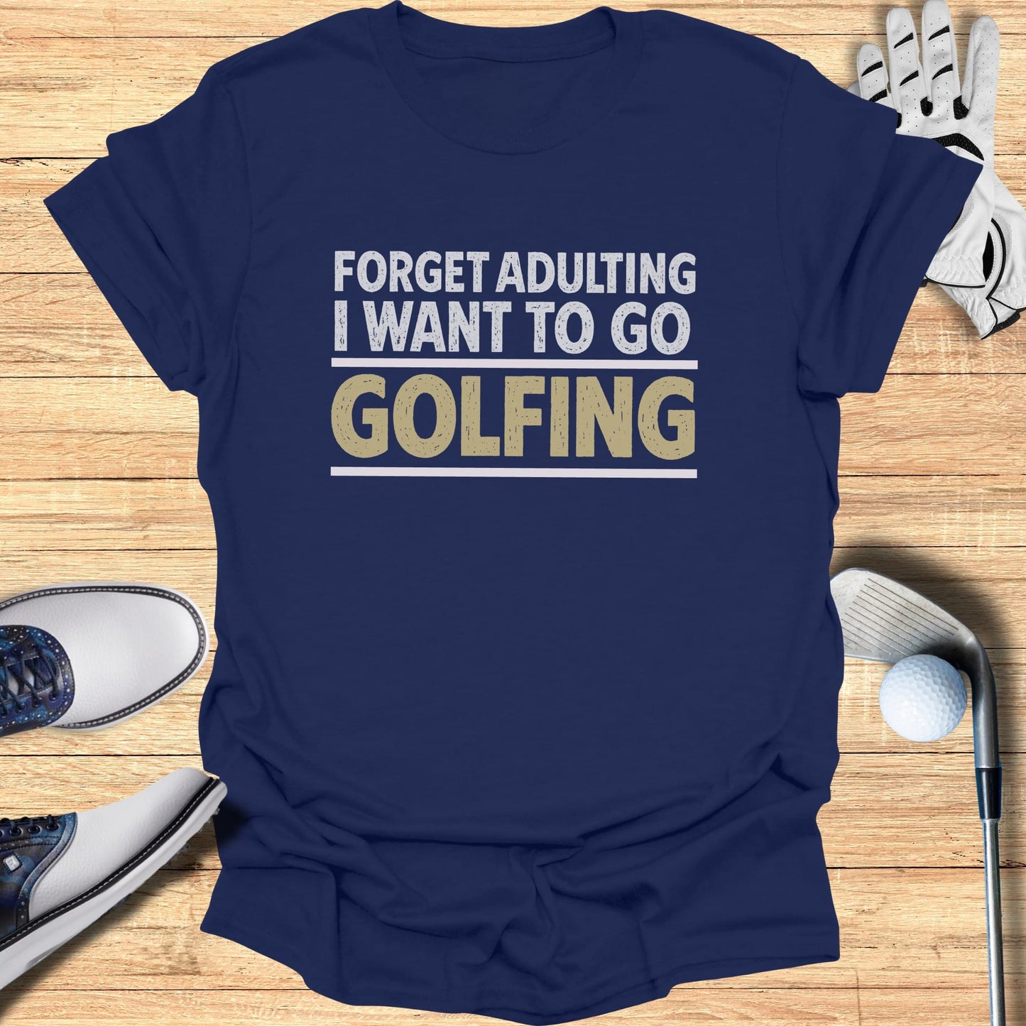 Navy t-shirt with "Forget Adulting I Want to Go Golfing" text.