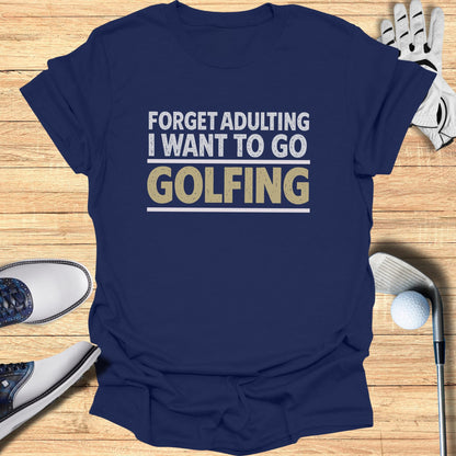Navy t-shirt with "Forget Adulting I Want to Go Golfing" text.