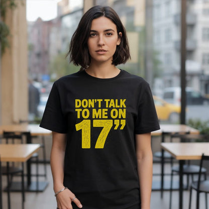 Black t-shirt with yellow text "DON'T TALK TO ME ON 17".