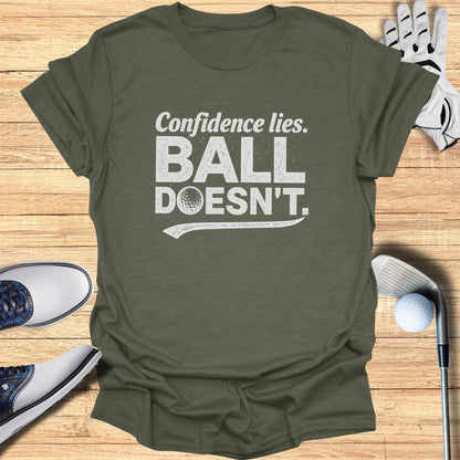 T-shirt with "Confidence lies. BALL DOESN'T." text and golf accessories.
