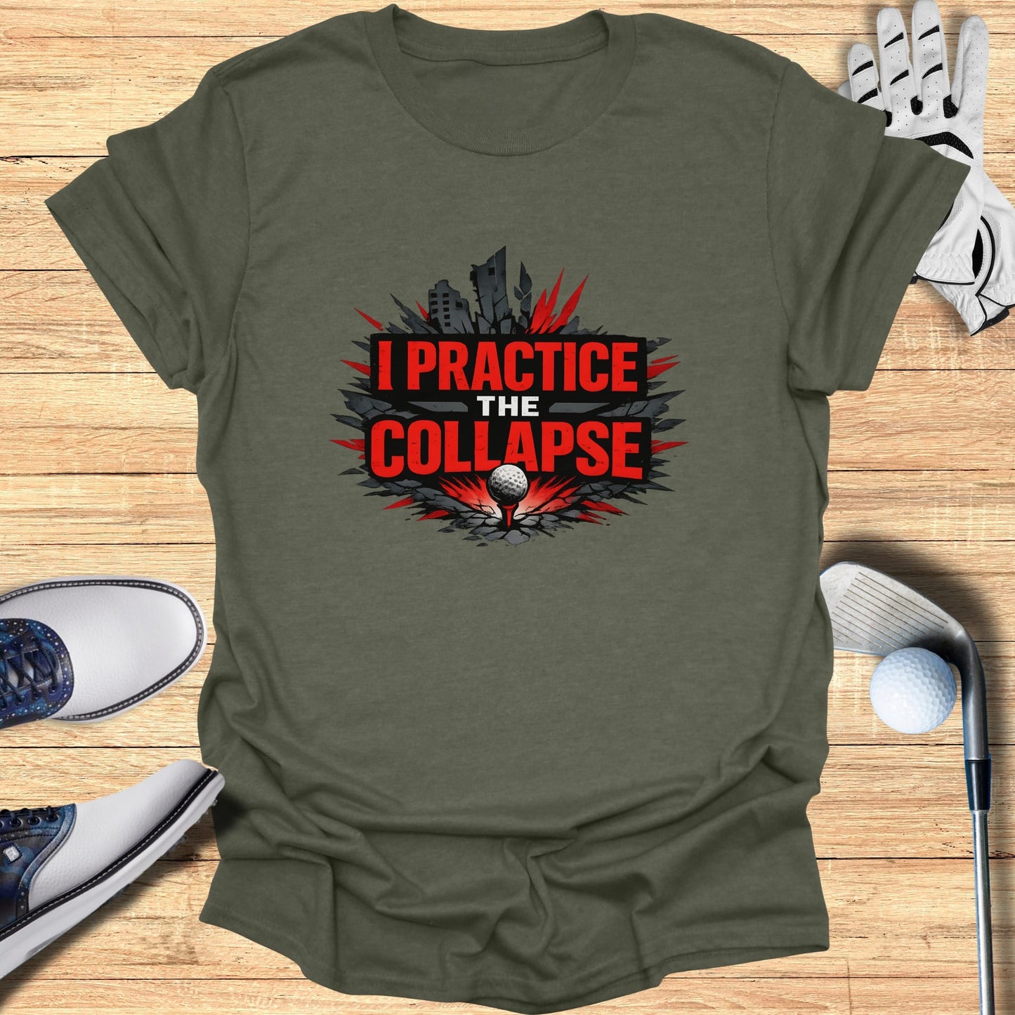 Olive green t-shirt with "I PRACTICE THE COLLAPSE" text and a crumbling cityscape graphic.