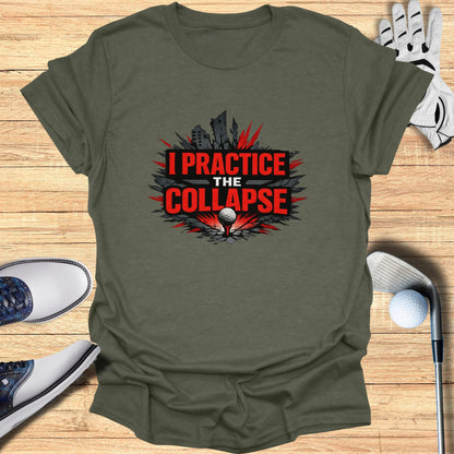 Olive green t-shirt with "I PRACTICE THE COLLAPSE" text and a crumbling cityscape graphic.