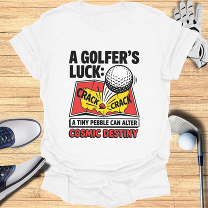 White t-shirt with "A Golfer's Luck: A Tiny Pebble Can Alter Cosmic Destiny" text and golf imagery.