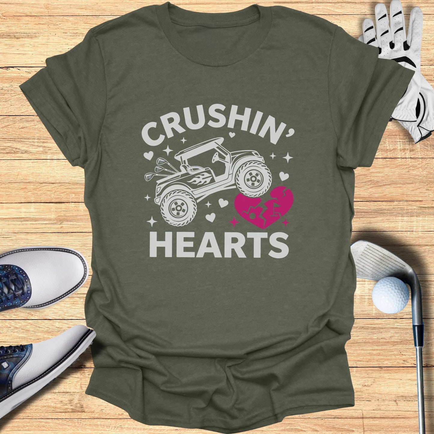 Olive green t-shirt with "Crushin' Hearts" and a golf cart graphic.