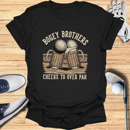 T-shirt with "Bogey Brothers Cheers to Over Par" text and beer mugs with golf balls.