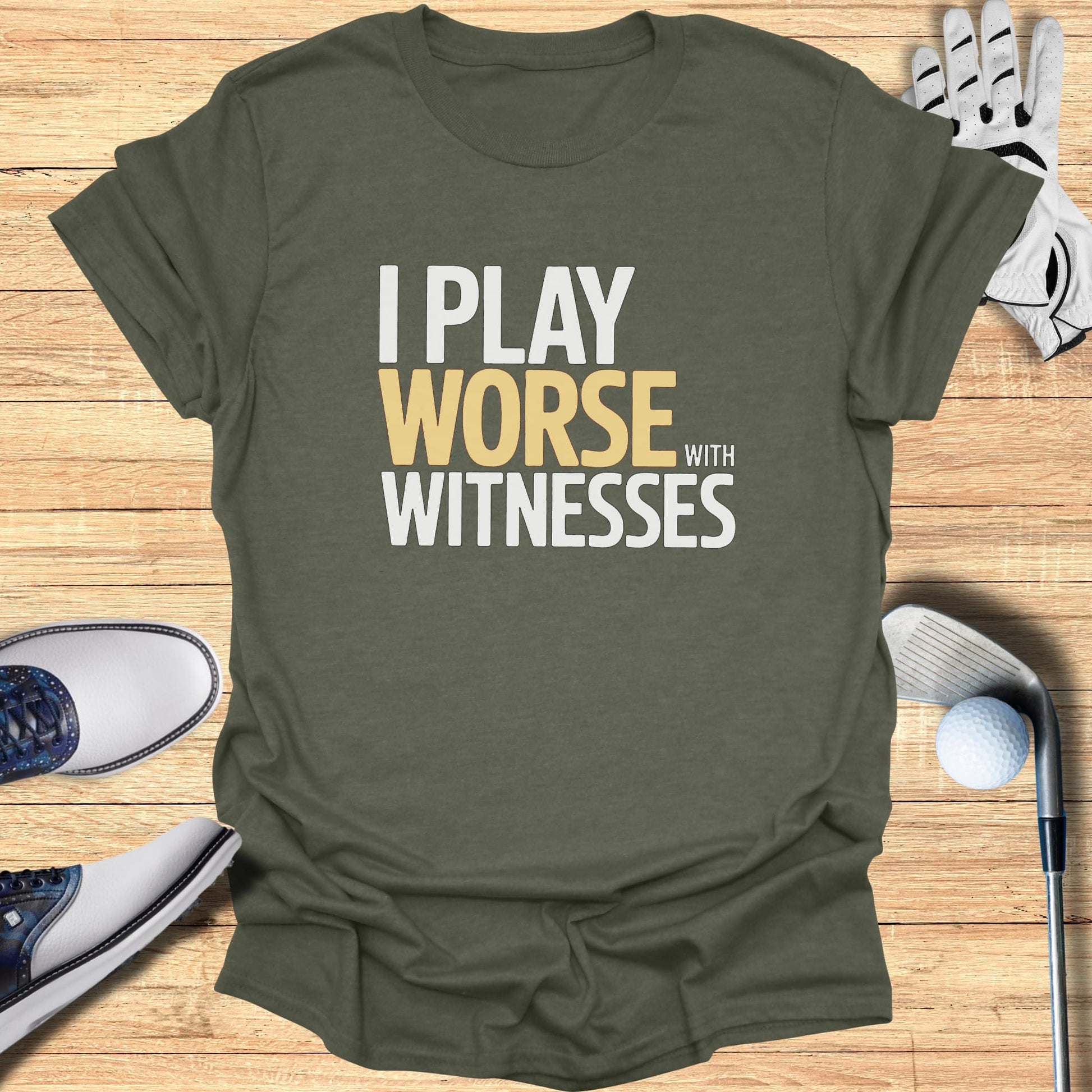 Olive t-shirt with "I PLAY WORSE WITH WITNESSES" text in white and yellow.
