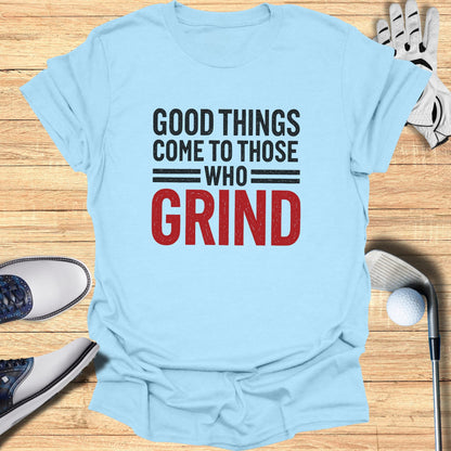 Light blue t-shirt with "GOOD THINGS COME TO THOSE WHO GRIND" in black and red text.