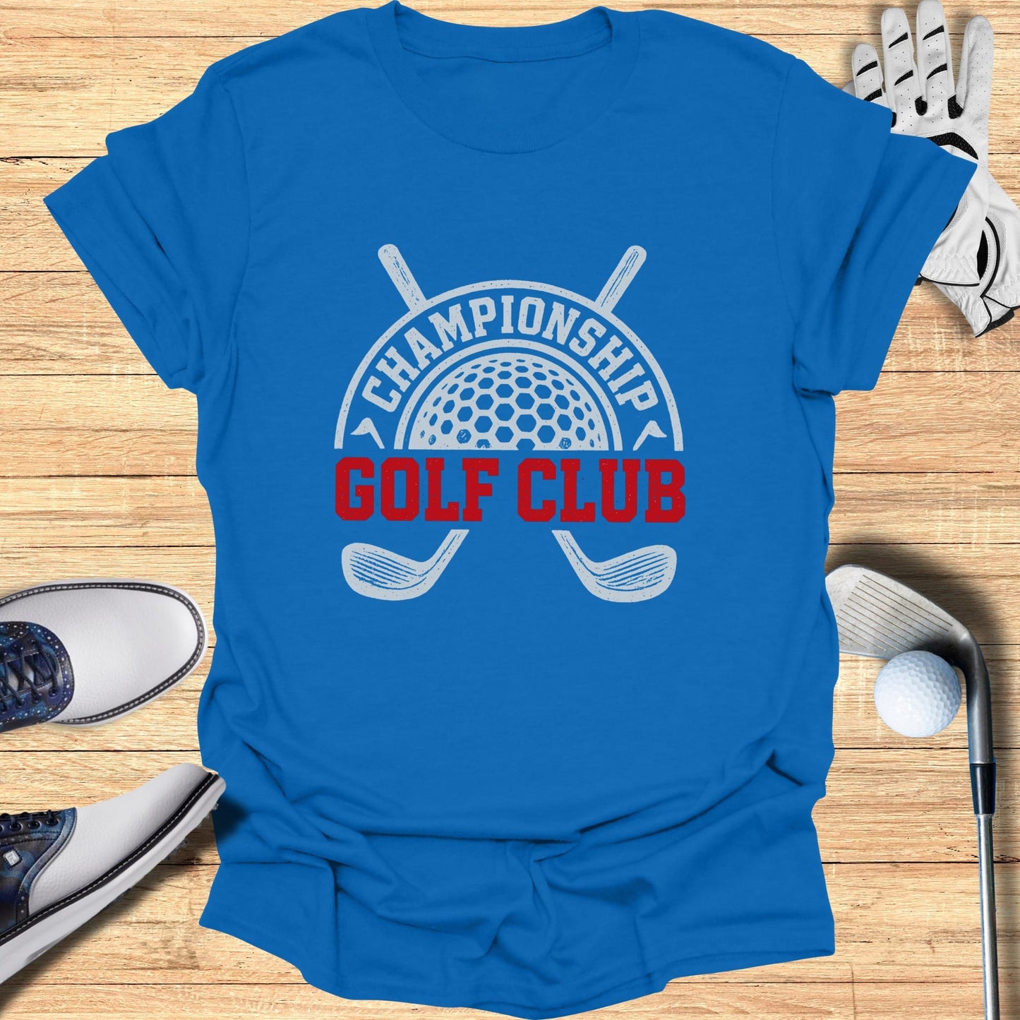 Blue t-shirt with "Championship Golf Club" text and crossed golf clubs graphic.