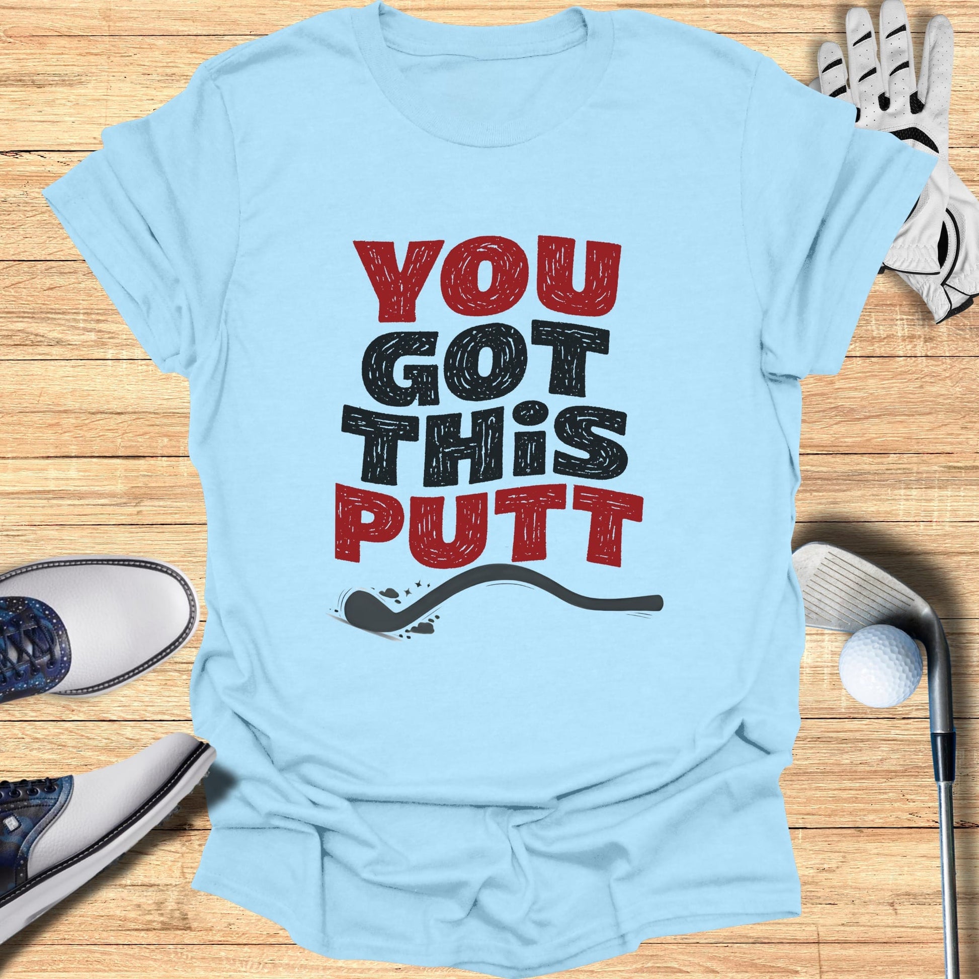 Light blue t-shirt with "YOU GOT THIS PUTT" text and golf club illustration.