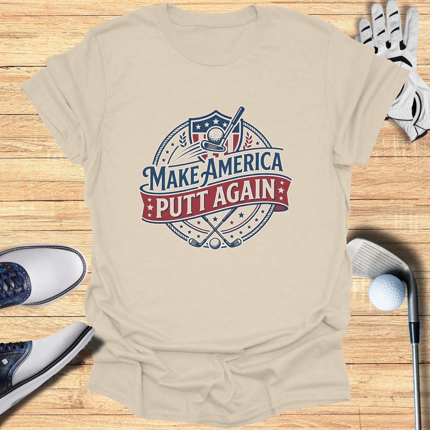 Golf shirt with "Make America Putt Again" text and golf graphics.