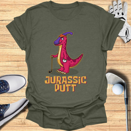 T-shirt with cartoon T-Rex golfer and "Jurassic Putt" text.