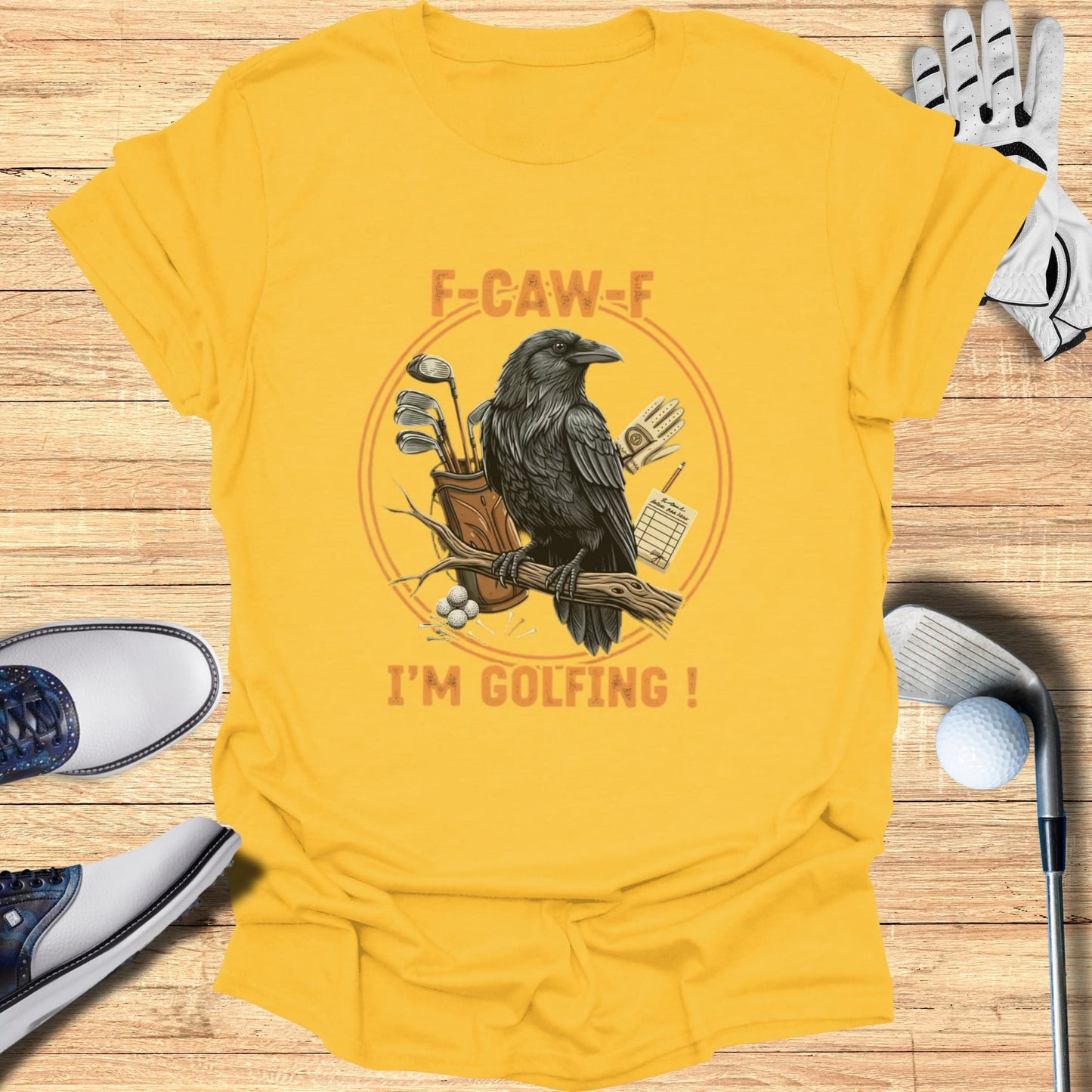 Yellow t-shirt with crow and golf clubs, "F-CAW-F I'M GOLFING!" text.