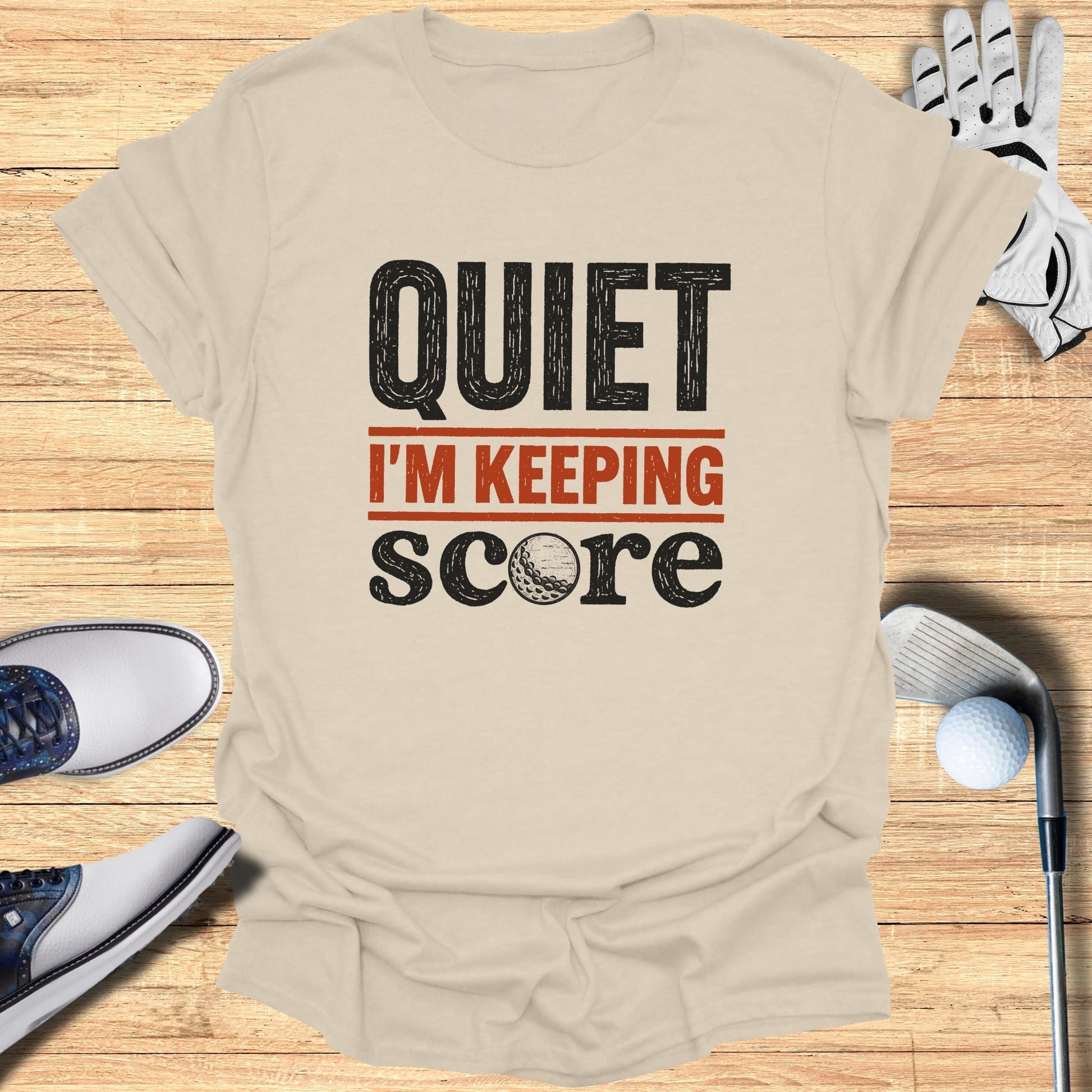 Cream t-shirt with bold black text reading "QUIET" above "I'M KEEPING SCORE".