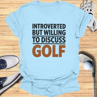 Light blue t-shirt with "INTROVERTED BUT WILLING TO DISCUSS GOLF" text.