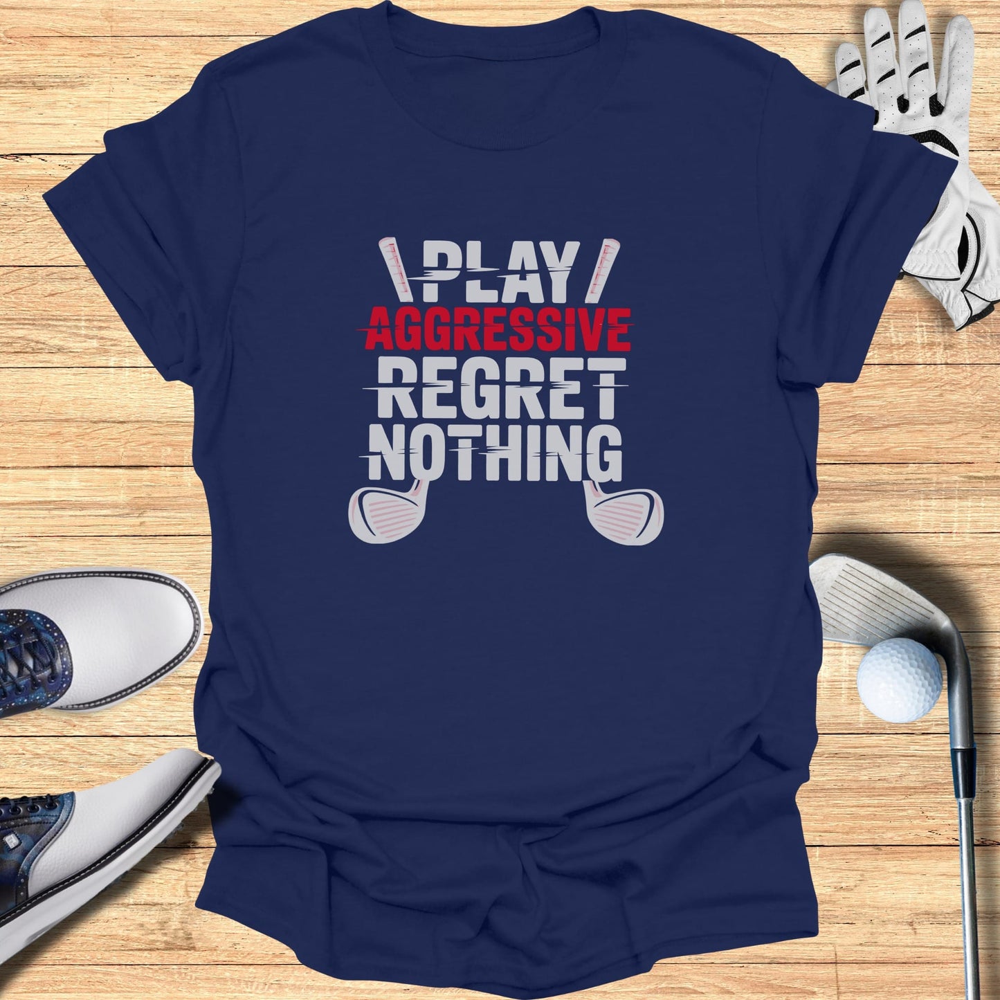 Navy t-shirt with "PLAY AGGRESSIVE REGRET NOTHING" in red and white text.