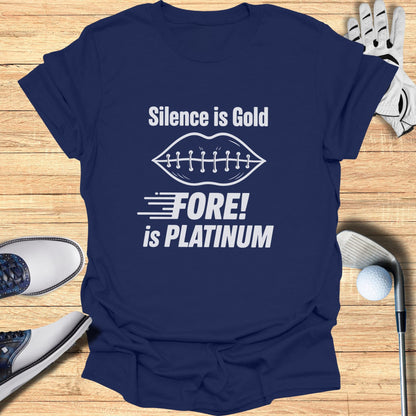 Navy t-shirt with "Silence is Gold, Fore! is Platinum" text and golf accessories.