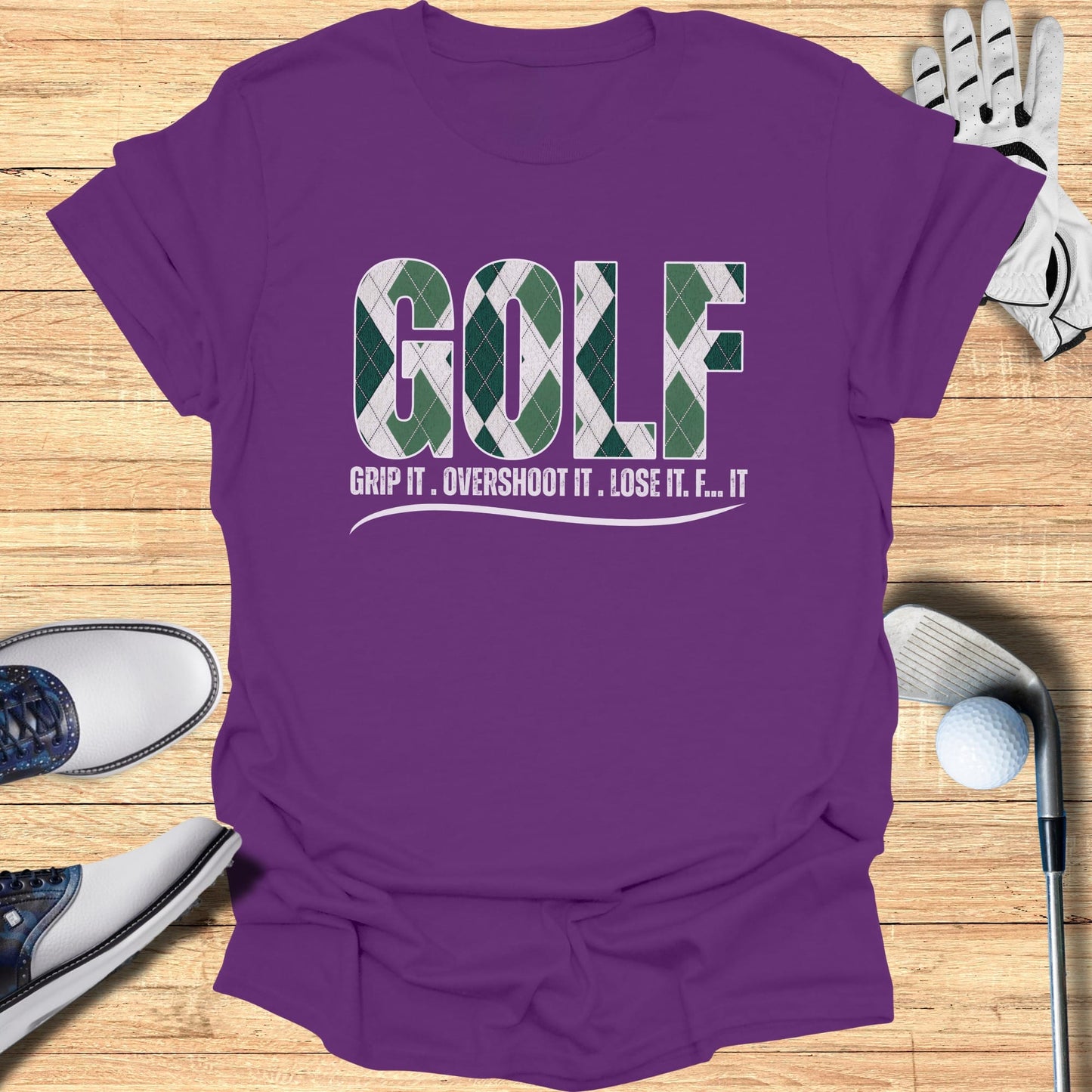 Purple t-shirt with "GOLF" in green and white argyle, and "GRIP IT. OVERSHOOT IT. LOSE IT. F... IT..." below.
