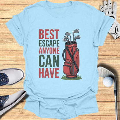Light blue t-shirt with golf bag and clubs, and text "BEST ESCAPE ANYONE CAN HAVE".