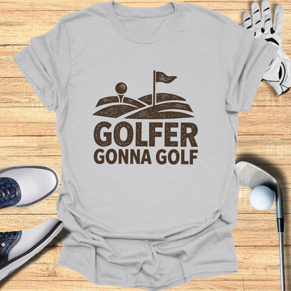 T-shirt with "Golfer Gonna Golf" text, golf ball, flag, and clubs.