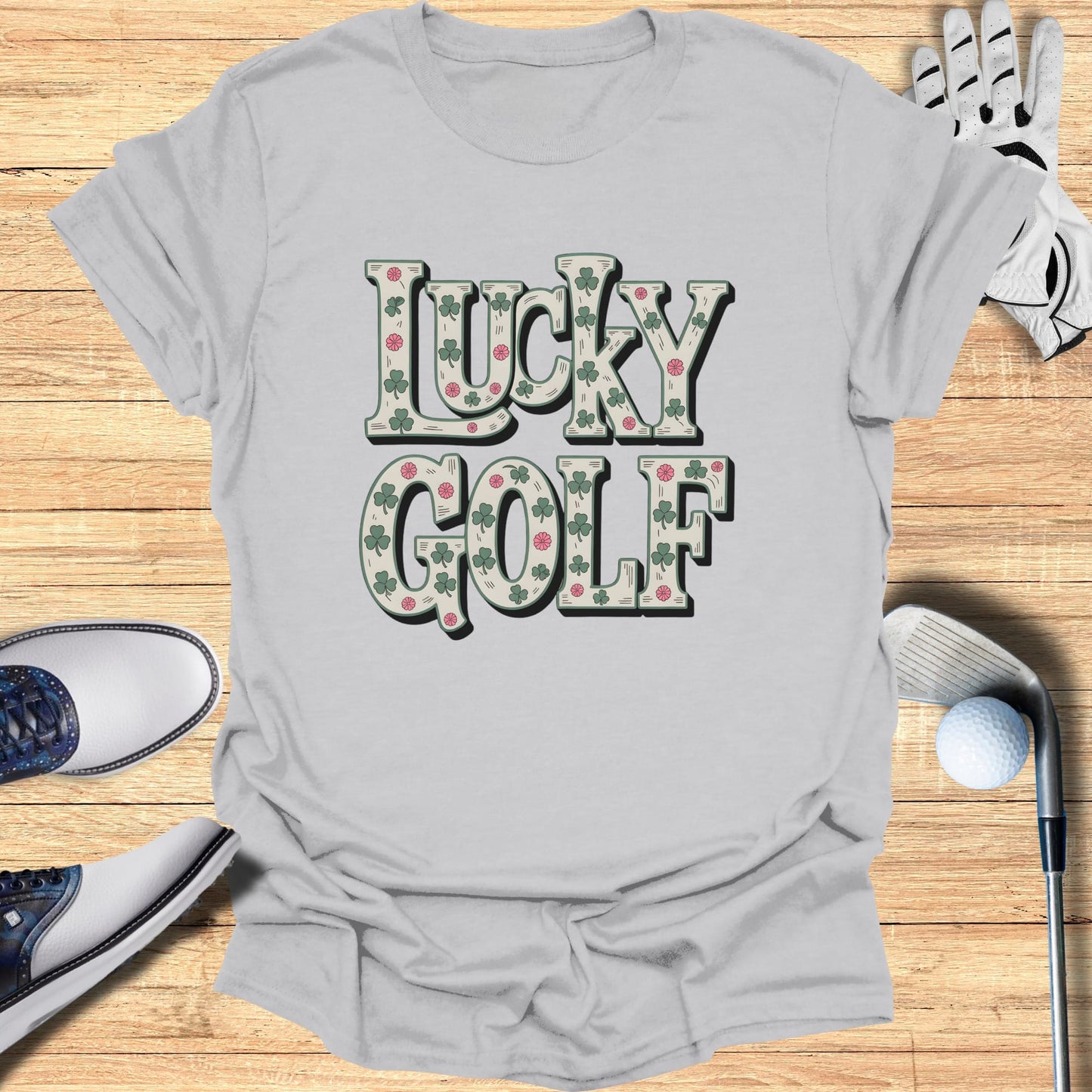 Gray t-shirt with "Lucky Golf" text and shamrock and dot pattern.