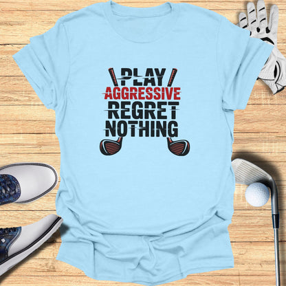 Light blue t-shirt with "PLAY AGGRESSIVE REGRET NOTHING" and crossed golf clubs.