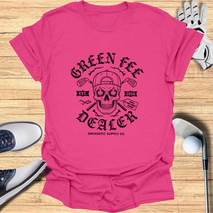 Pink t-shirt with "Green Fee Dealer" skull graphic and "Swingepic Supply Co." text.