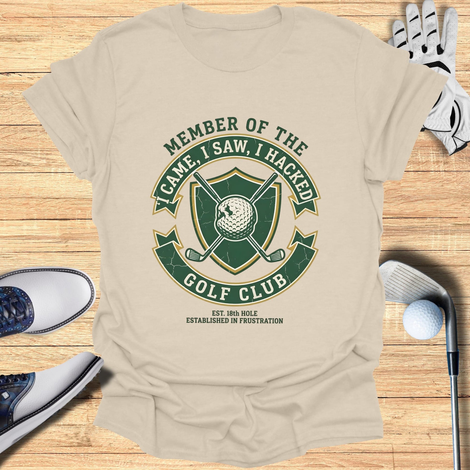 T-shirt with "Member of the Golf Club" crest and golf equipment.