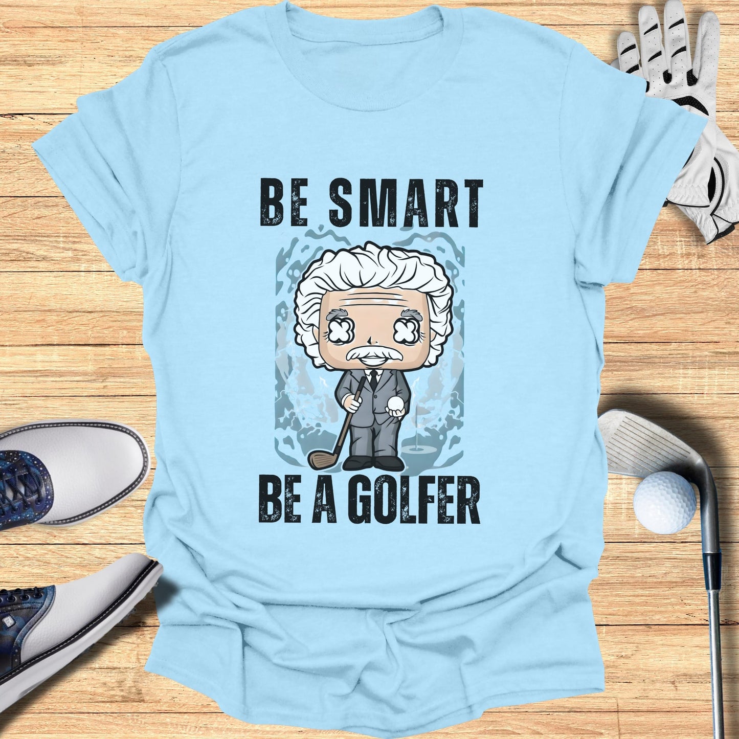 Light blue t-shirt with "BE SMART BE A GOLFER" text and cartoon man.
