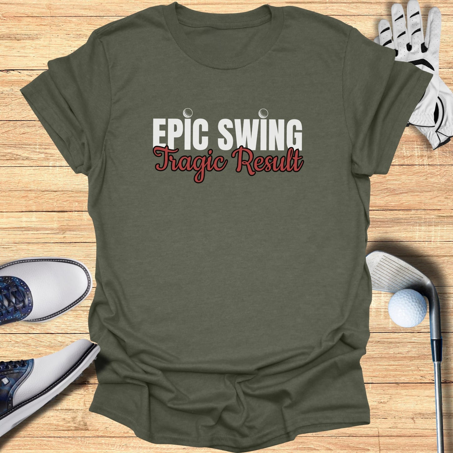 T-shirt with text "Epic Swing Tragic Result" and golf accessories.