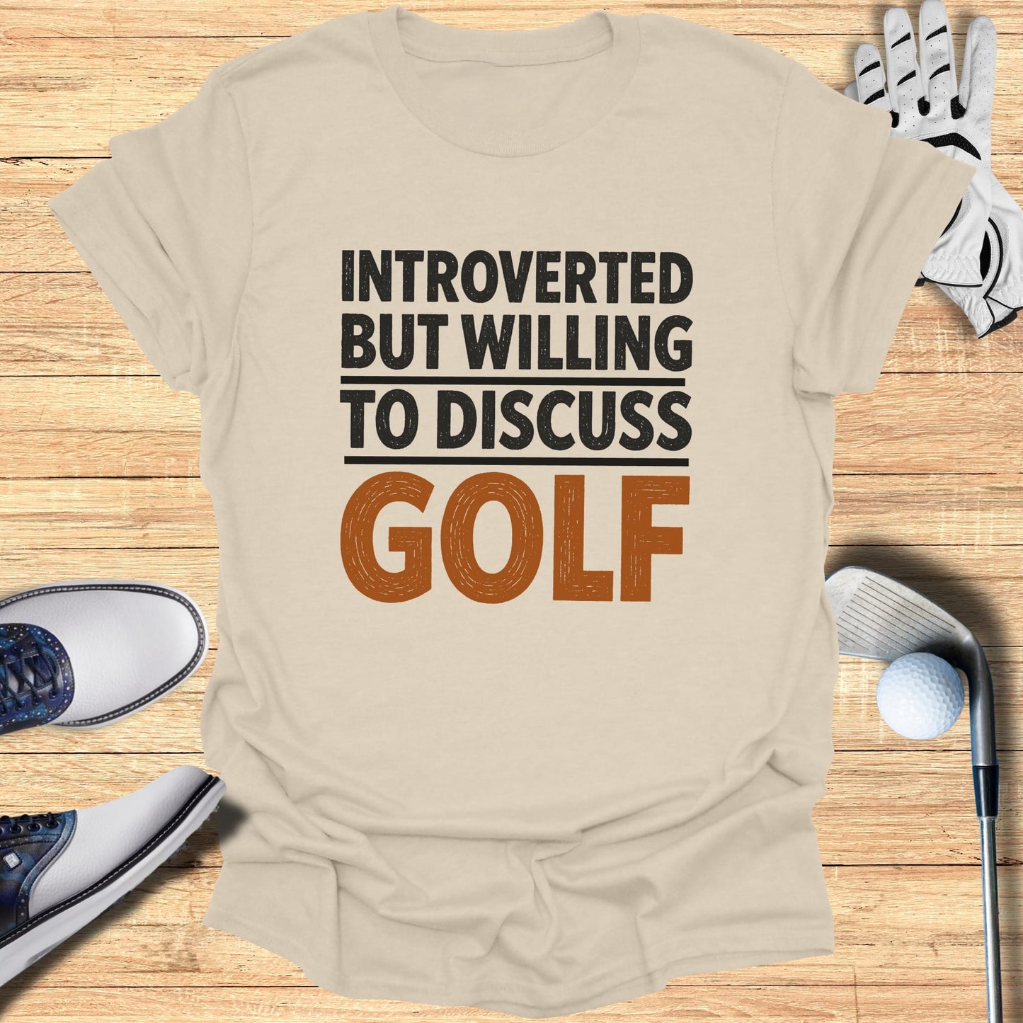 T-shirt with text "INTROVERTED BUT WILLING TO DISCUSS GOLF".