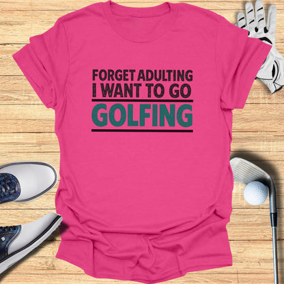Pink t-shirt with text "Forget Adulting I Want To Go Golfing".