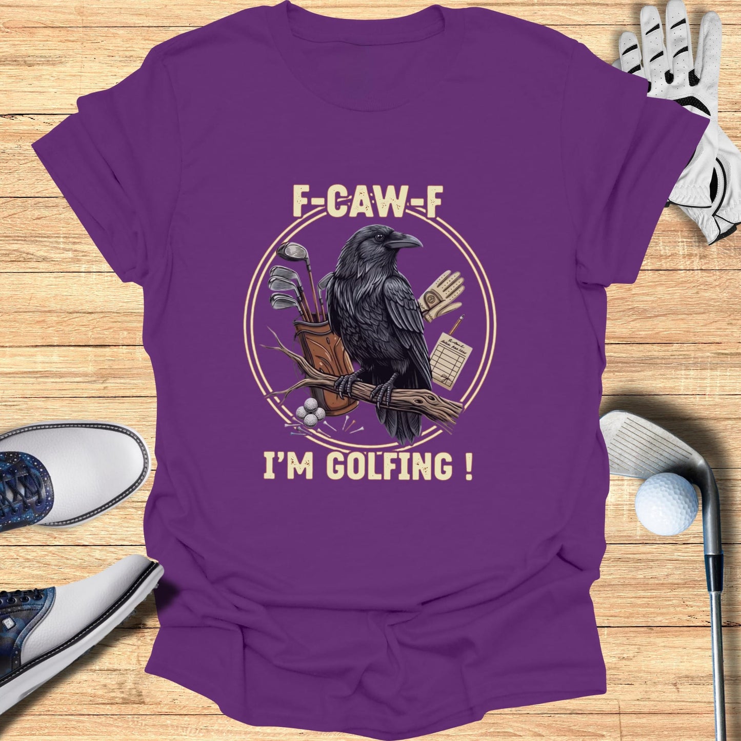 Purple t-shirt with a raven holding golf clubs and the text "F-CAW-F I'M GOLFING!".